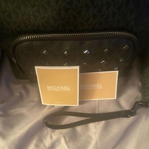 New with tags Michael Kors studded backpack with wallet.